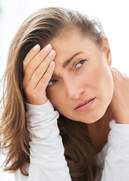 Woman with head and neck pain